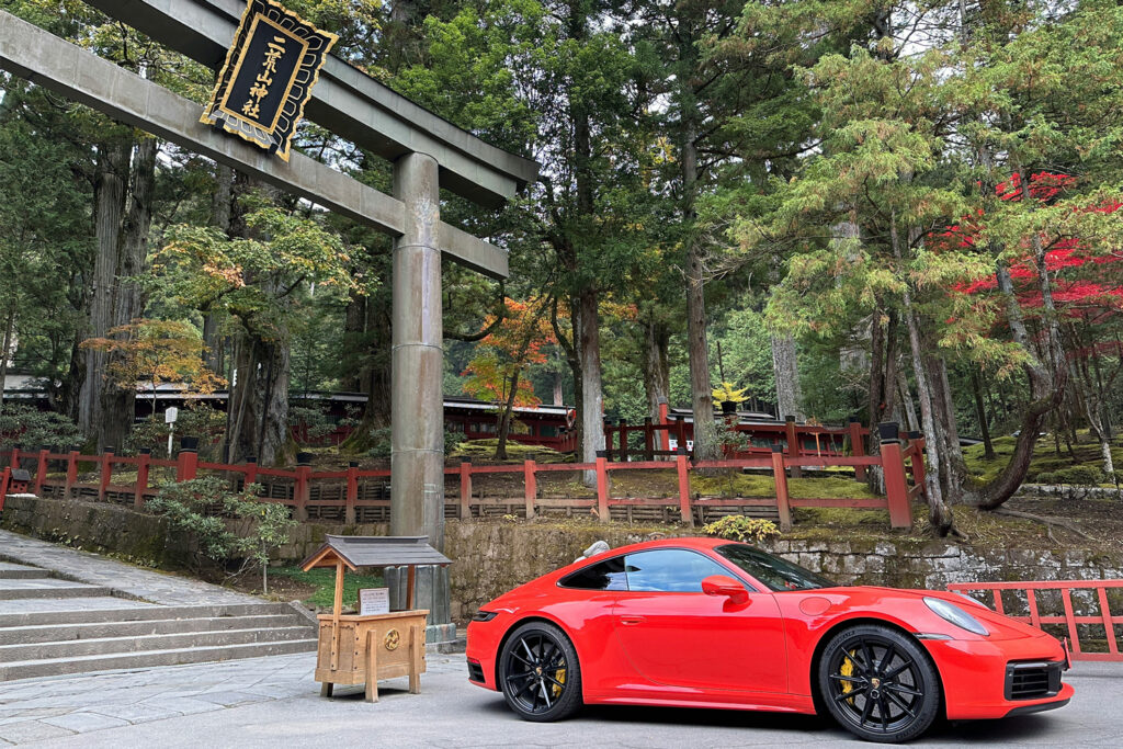 Nikko: UNESCO Heritage Sites in Mountain Settings: A luxury car at a shrine