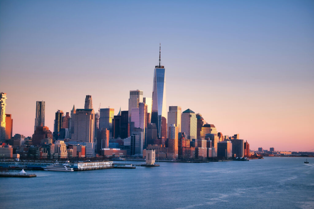 An image of the New York skyline and sunrise