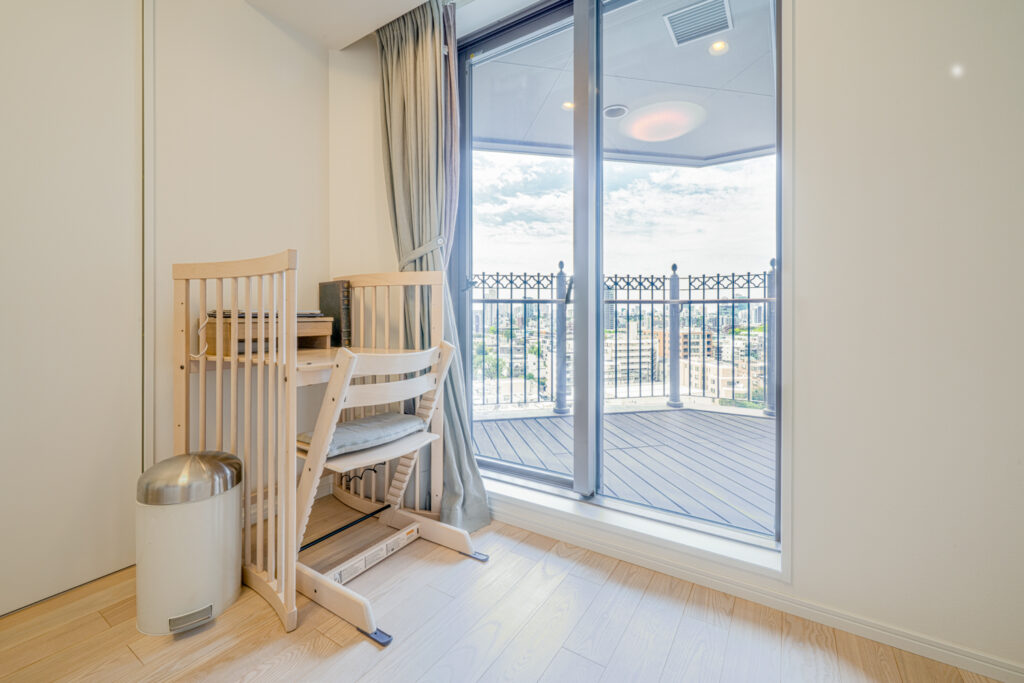 An image of the Interior of Motoazabu Hills Forest Tower, in Minato, showing a balcony in a bedroom Apartment for sale in Minato, Tokyo, Units for sale with Housing Japan