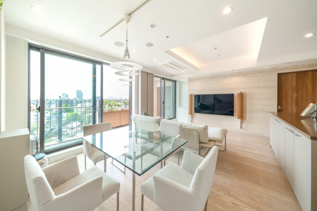 Interior Motoazabu Hills Forest Tower, in Minato showing living area with modern design